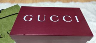 Caja y bolsa Gucci