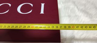 Caja y bolsa Gucci