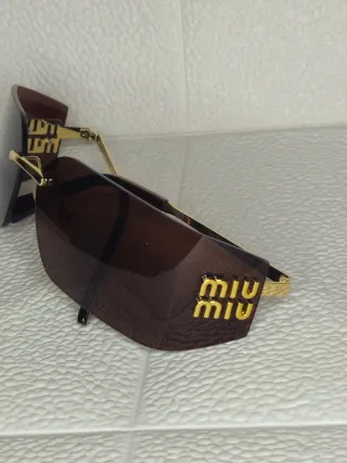 Occhiali da sole Miu Miu - Marroni e Oro