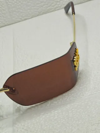 Occhiali da sole Miu Miu - Marroni e Oro