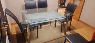 Mesa cristal + 6 sillas negras