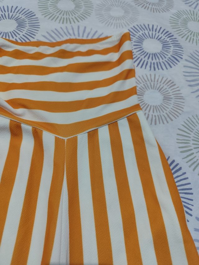 Mono rayas naranja-blanco