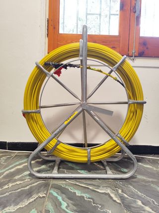 Rola, pasacable fibra óptica