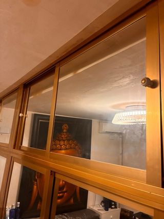 Armario frente con espejos en aluminio dorado