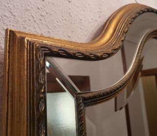 Espejo antiguo dorado con bisel