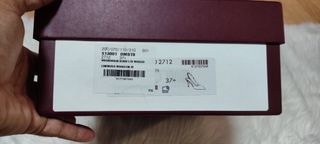 Caja y bolsa Gucci
