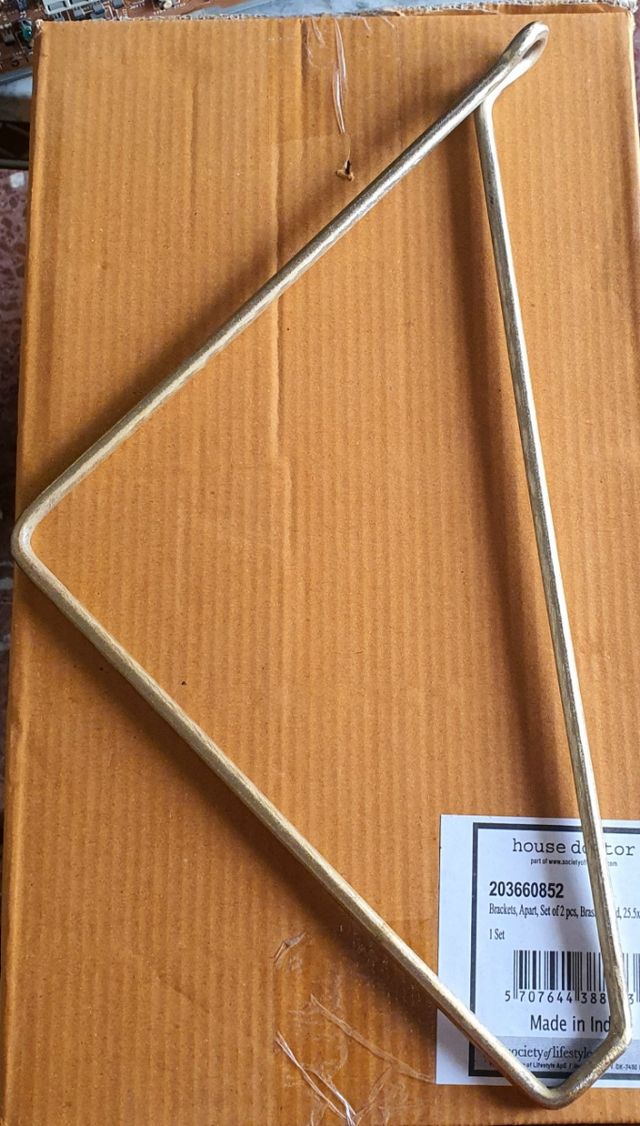 Soportes pared dorados House Doctor