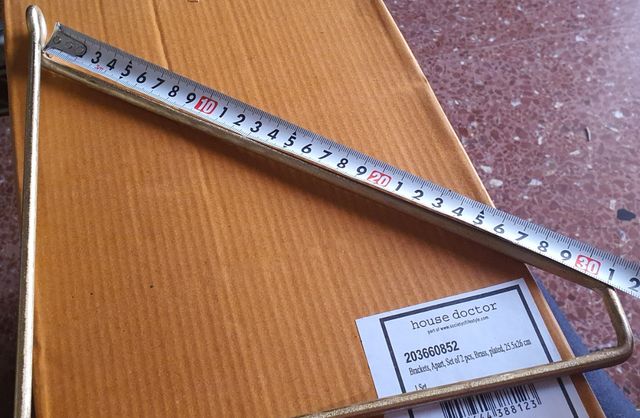 Soportes pared dorados House Doctor