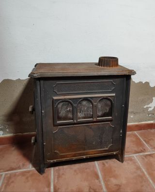 Estufa Hergom hierro fundido antigua