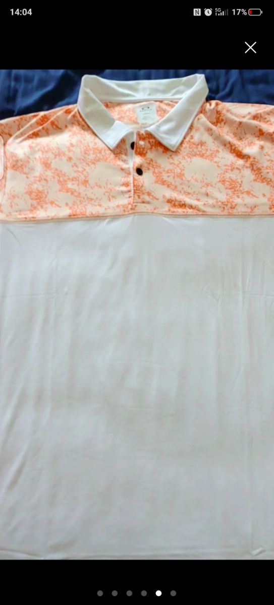 Polo Oakley naranja y blanco