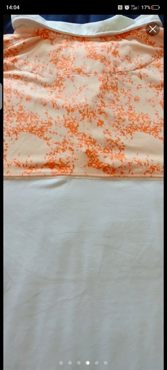 Polo Oakley naranja y blanco