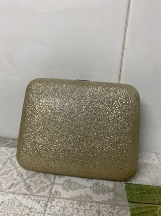 Bolso clutch dorado brillante