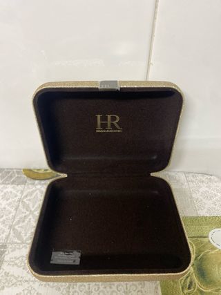 Bolso clutch dorado brillante