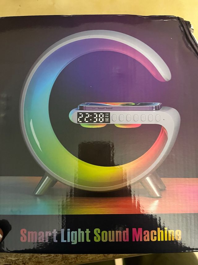 cargador con luz, sonido y reloj NUEVO