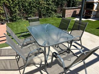 Conjunto mesa y seis sillas