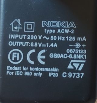 Cargador Nokia 6.8v 1.4A DC Premicell