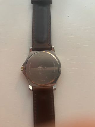 Reloj Croton marrón y plata negociable 