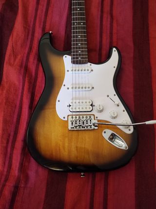 Guitarra eléctrica Fender squier doble pastilla.
