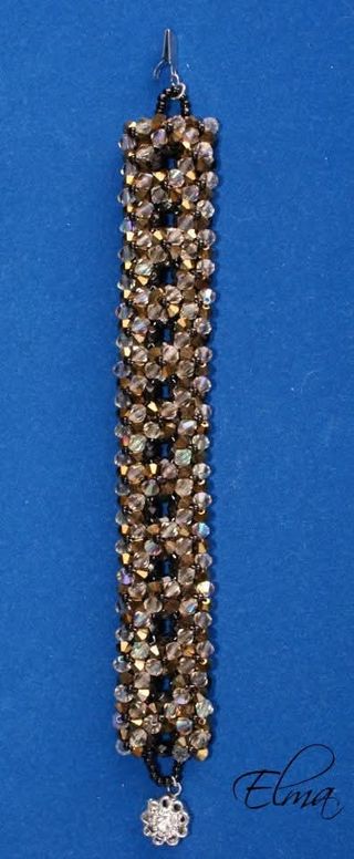 Pulsera Swarovski negra y dorada