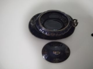 Sopera azul y plata decorativa