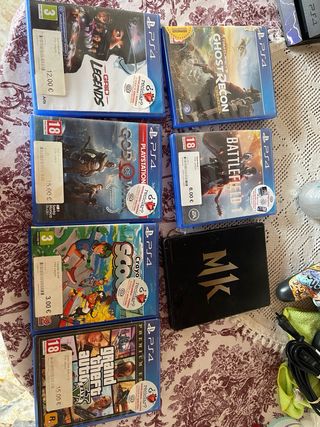 PS4 (PlayStation 4) 1TB + 2 mandos 
