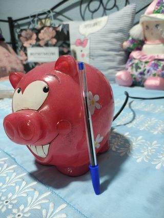 Lampara de cerdito rosa.