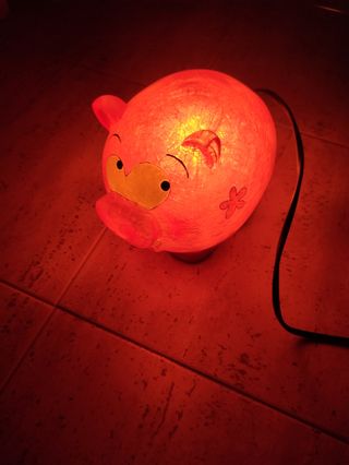 Lampara de cerdito rosa.