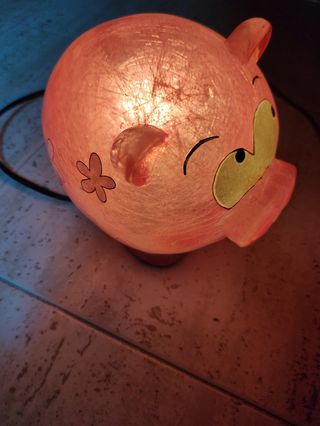 Lampara de cerdito rosa.