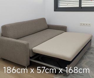 Sofá cama gris de alta gama con otomana