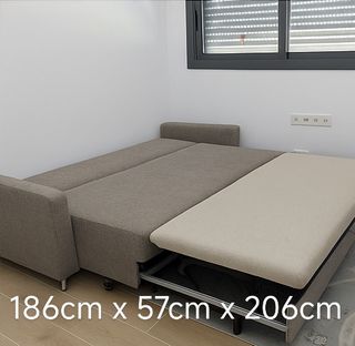 Sofá cama gris de alta gama con otomana