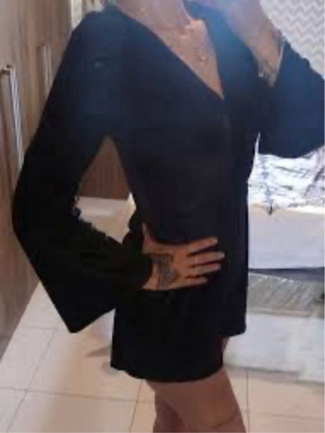 Enterizo negro corto manga larga