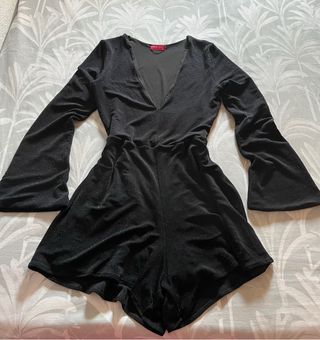 Enterizo negro corto manga larga