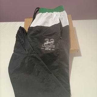 Pantalón Lacoste mujer ancho bolsillos cremallera 