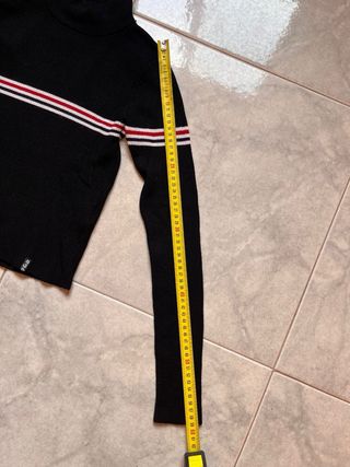 Maglione collo alto a righe
