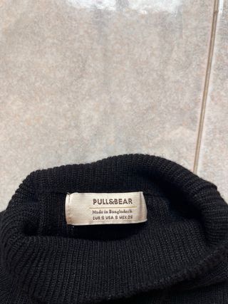 Maglione collo alto a righe