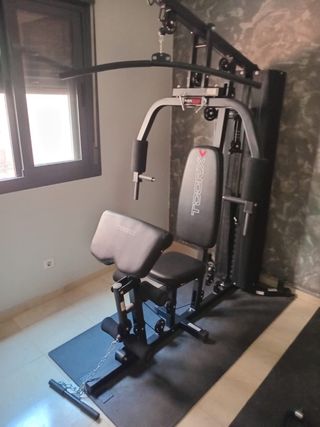 Máquina musculación multifunción y mancuernas