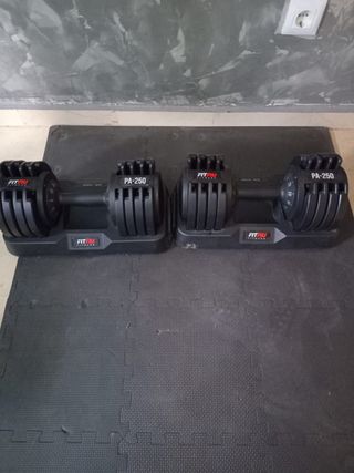 Máquina musculación multifunción y mancuernas