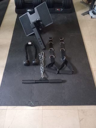 Máquina musculación multifunción y mancuernas