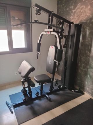 Máquina musculación multifunción y mancuernas