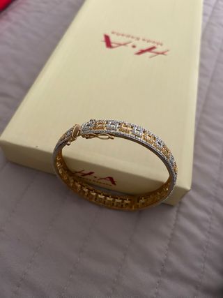 Pulsera H.A dorada y plateada
