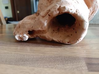 Scultura argilla cotta