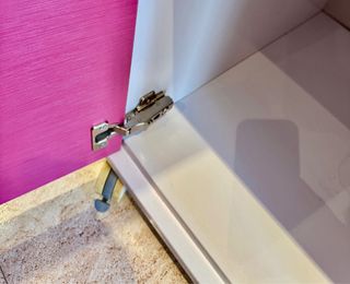 Mueble infantil rosa y blanco