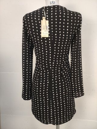 Vestito a pois bianco e nero