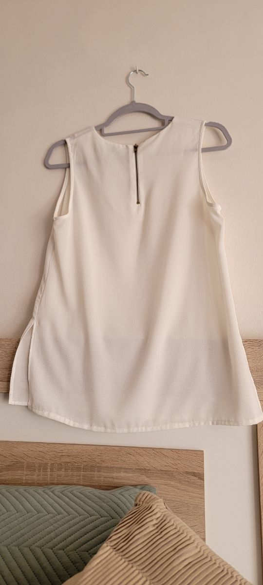 Blusa blanca sin mangas