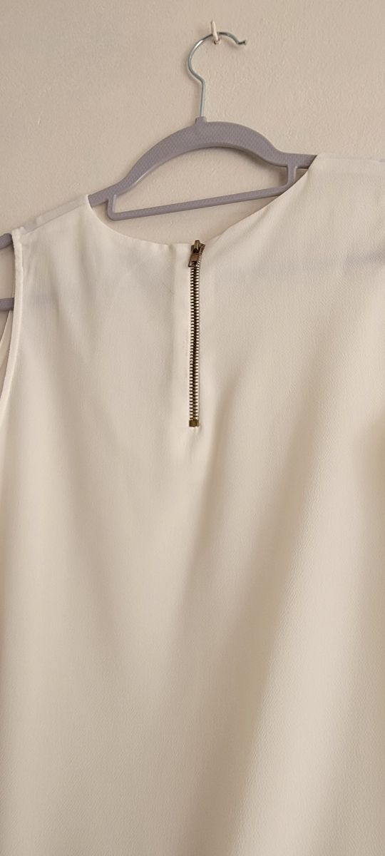 Blusa blanca sin mangas