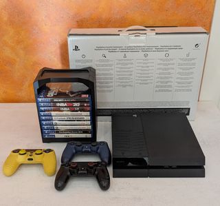 PS4 + 3 mandos y 9 juegos