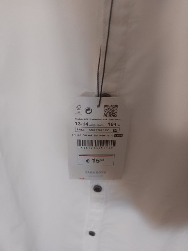 Camisa Zara blanca cuello maho 
Talla 13/14 años

