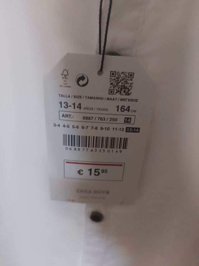 Camisa Zara blanca cuello maho 
Talla 13/14 años
