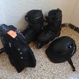 Patines Oxelo talla 45 + equip. seguridad