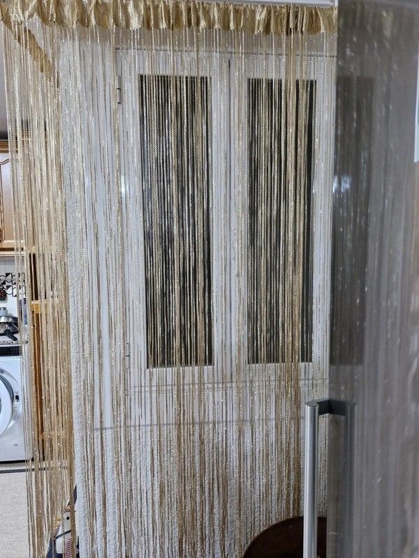 Cortinas hilo beige/doradas